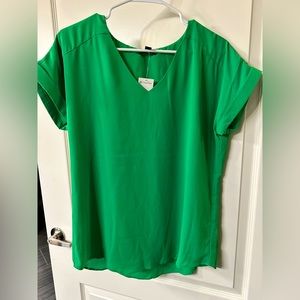Green blouse.